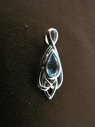 Silver Celtic Design Blue Topaz Pendant