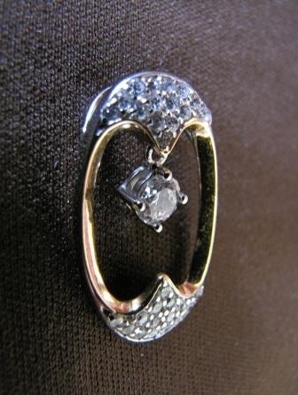 Oval Silver, Gold Cubic Zirconia Pendant
