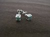 Silver Oval Emerald Stud Earrings