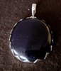 Oval Silver Speckled Amethyst Pendant