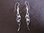 Silver Wavy Cubic Zirconia Drop Earrings